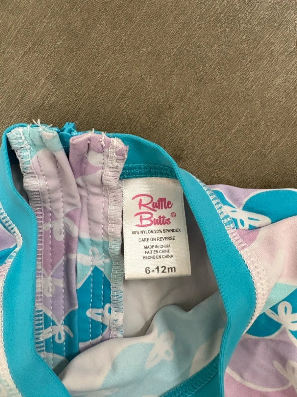 RuffleButts Mermaid Long Sleeve One-Piece Rash Guard 6-12m